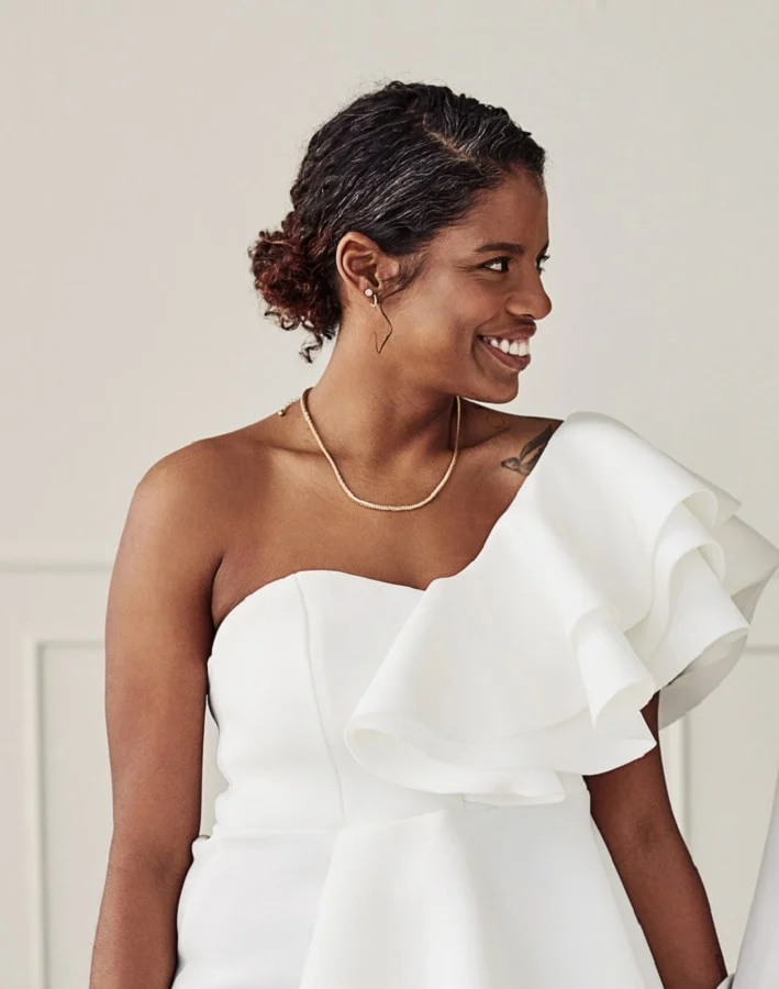 black women hairstyle with one shoulder wedding dress