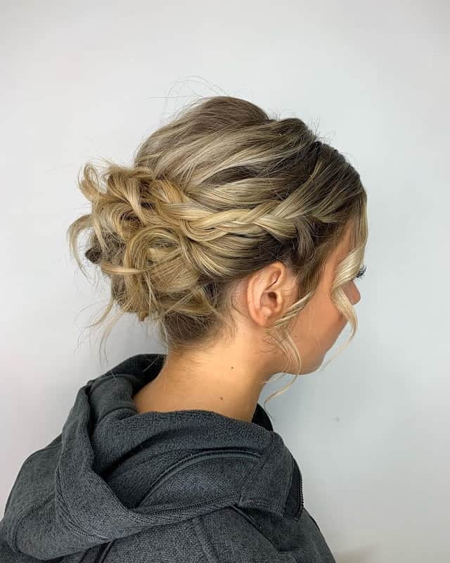 side braided bun with blonde balayage hair