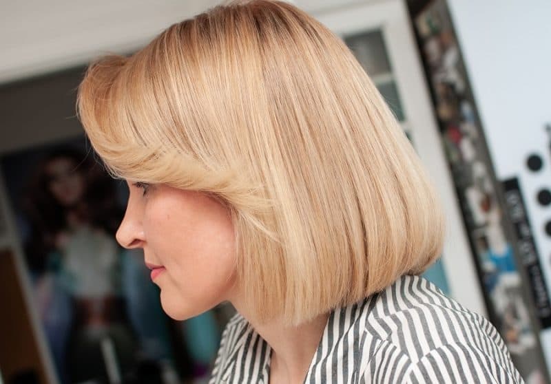 blonde bob with feathered bangs