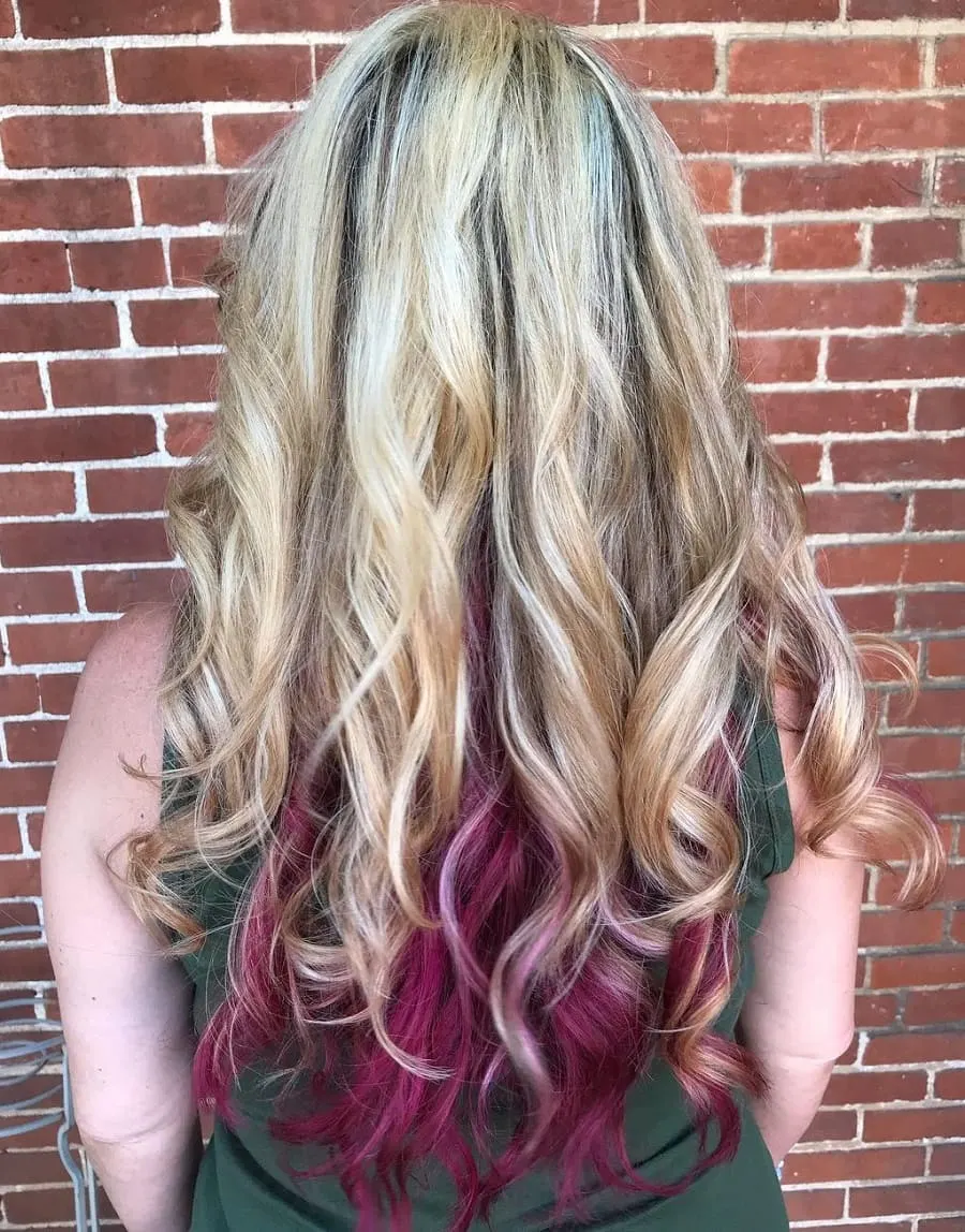 blonde curls with dark pink underneath