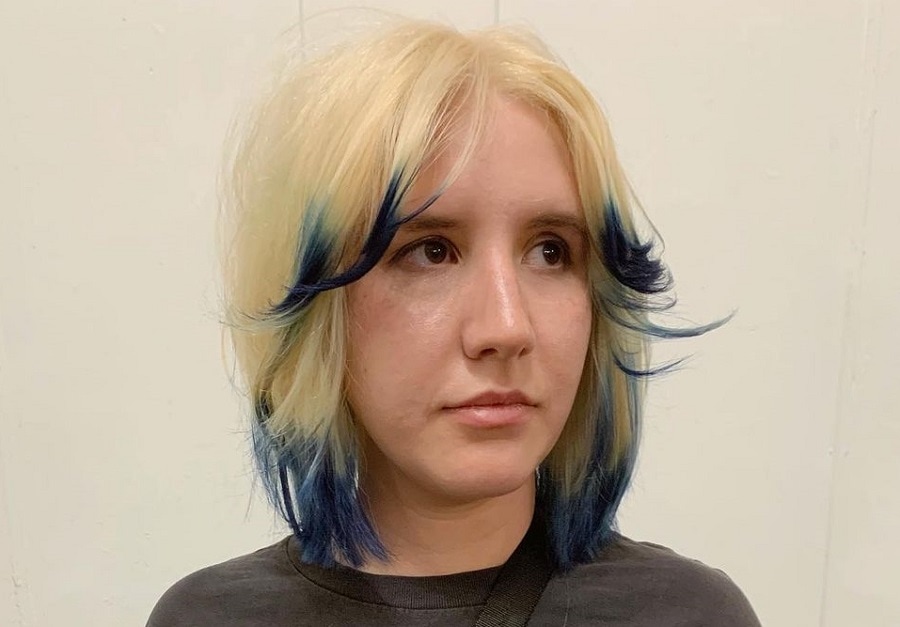 blonde curtain bangs with blue tips