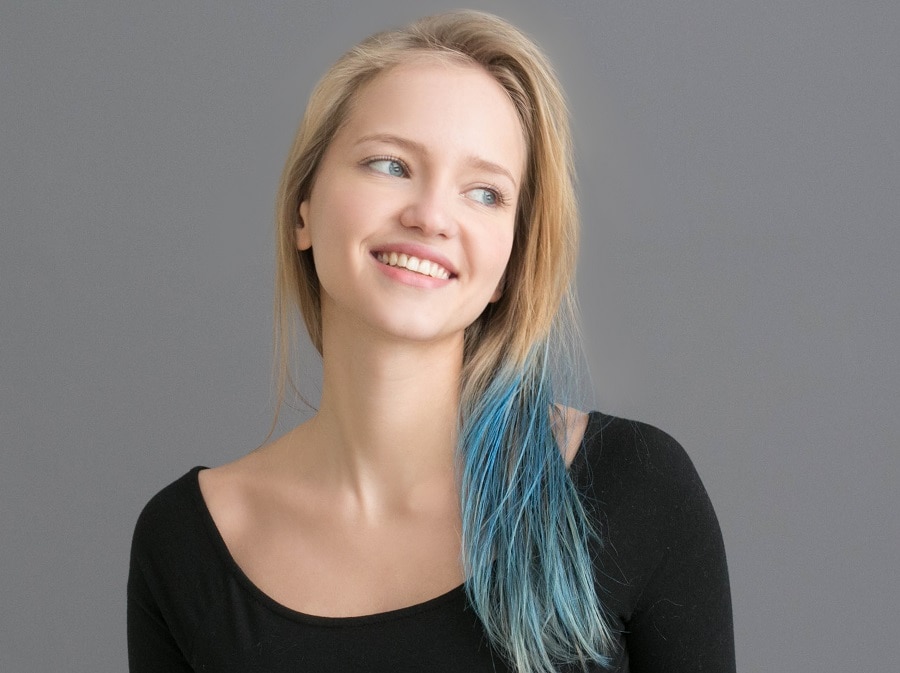Thin blonde hair with blue tips
