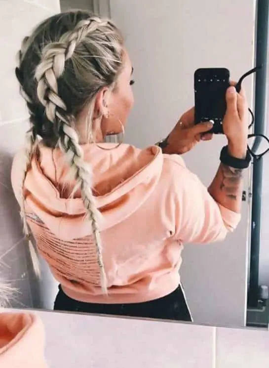 blonde braids with dark roots