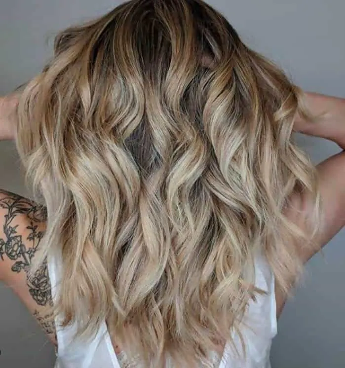 blonde balayage hair with dark roots