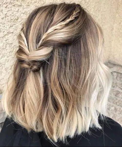 short braided hairstyle with blonde highlights