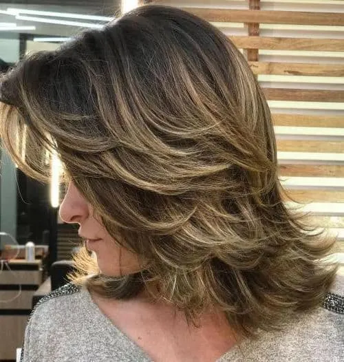 layered cut on medium blonde hair