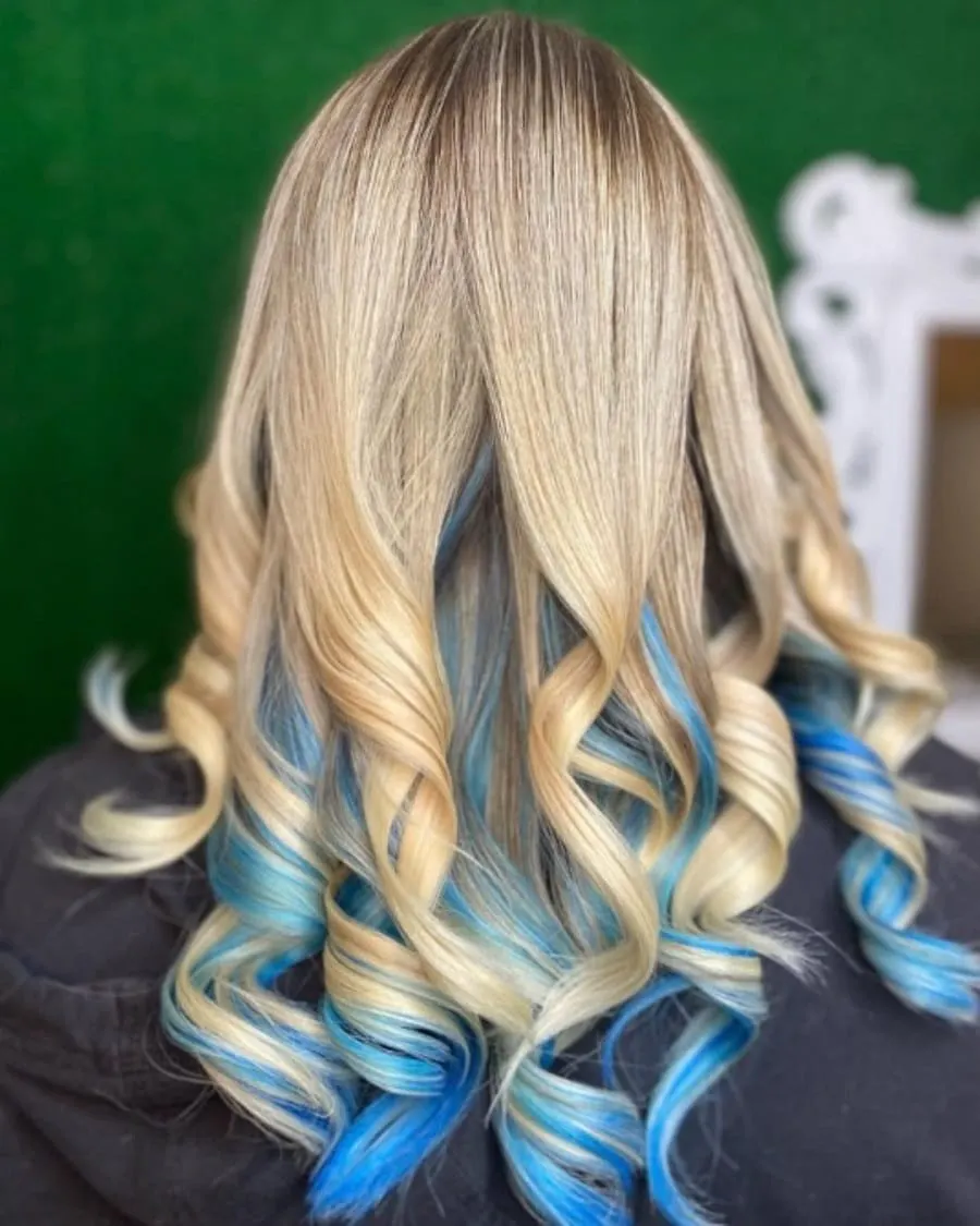 blonde loose curls with blue tips