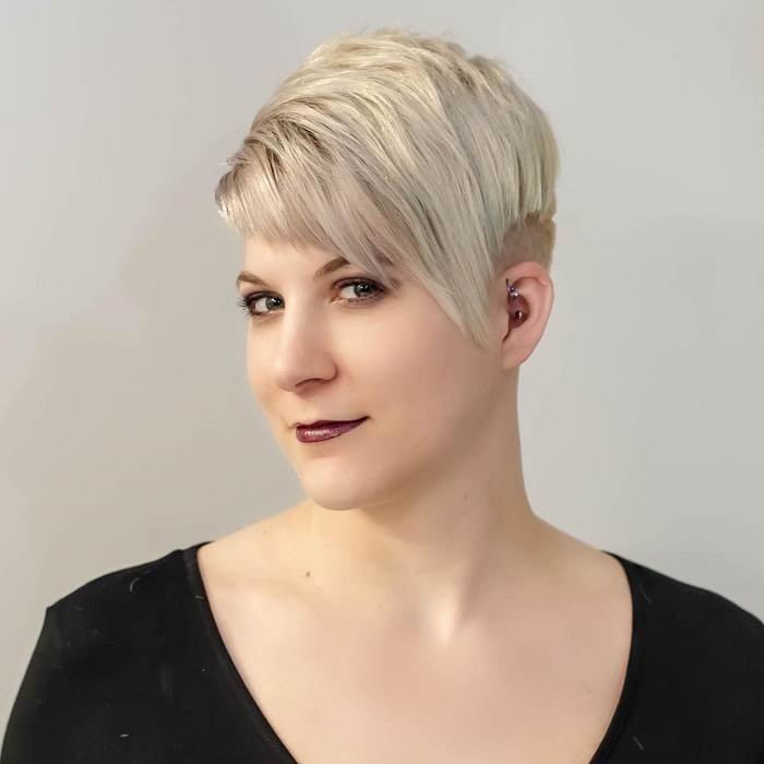 blonde pixie hair with long bangs