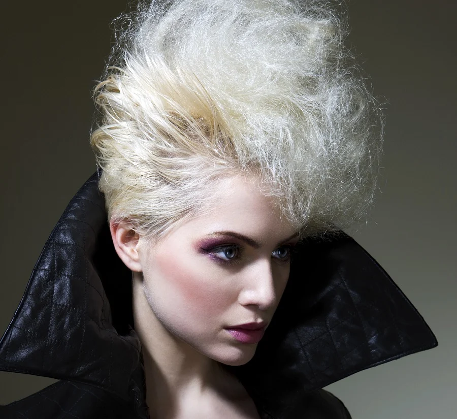 Blonde Woman With Fohawk Hairstyle .webp