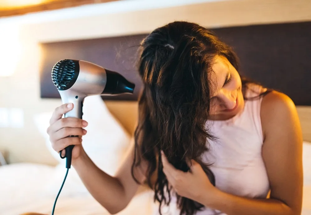 blow dry damp hair in cool setting