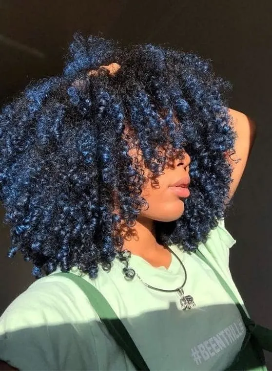 Curly Hair with Dark Blue Highlights