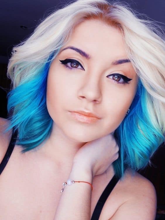 short blonde hair with blue highlights