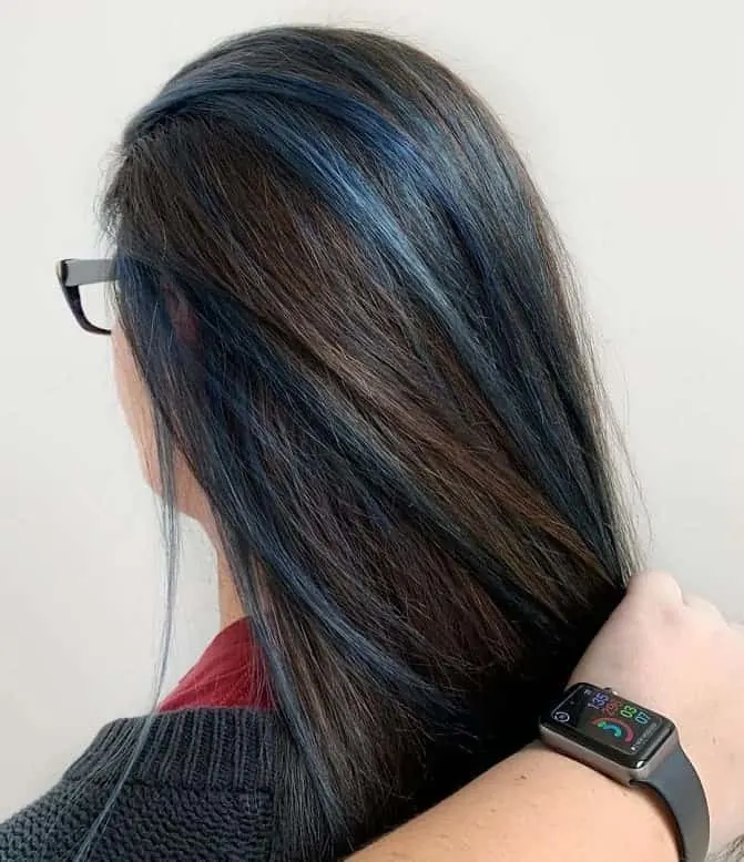Dark brown hair with blue highlights