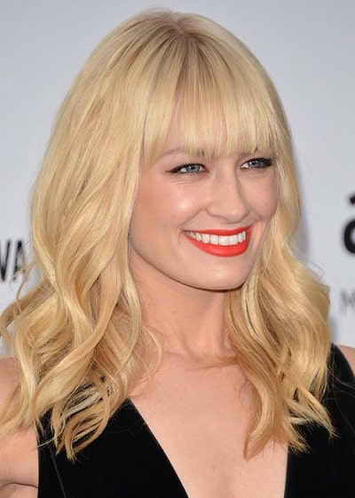 Actress Beth Behrs blunt bangs hairstyle