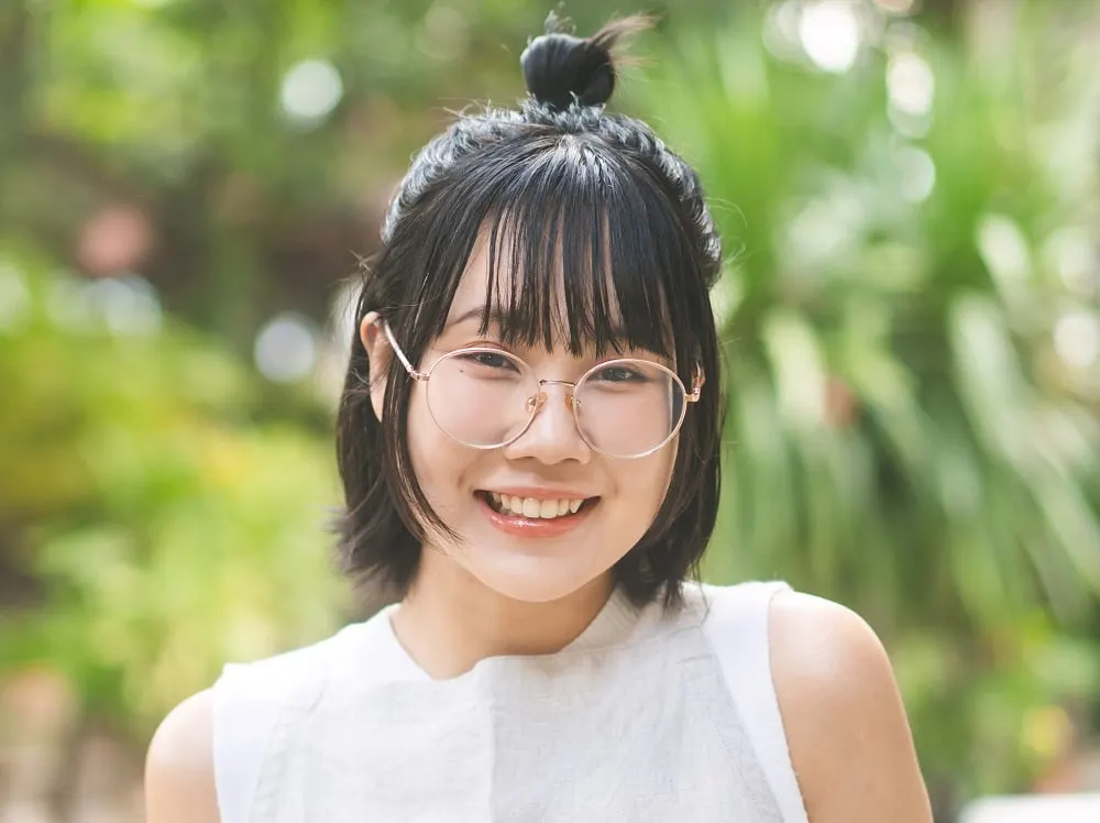 bob for round faced Asian women with glasses