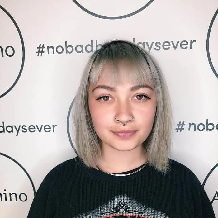 blunt bob with bangs for round faces 
