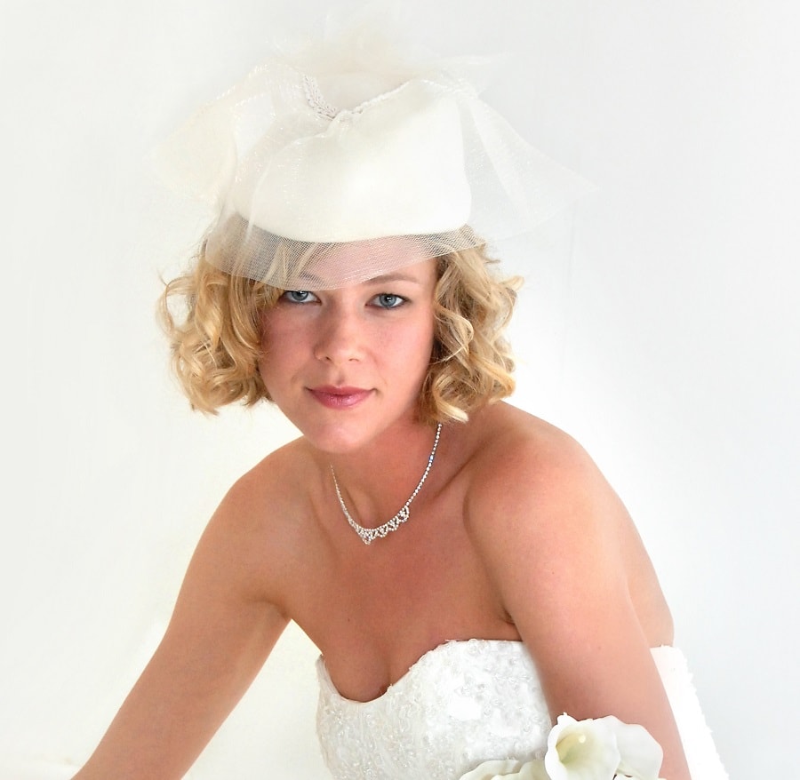 Bob hairstyle with hat for brides