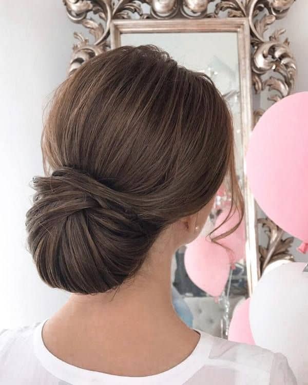 low bun bouffant hair