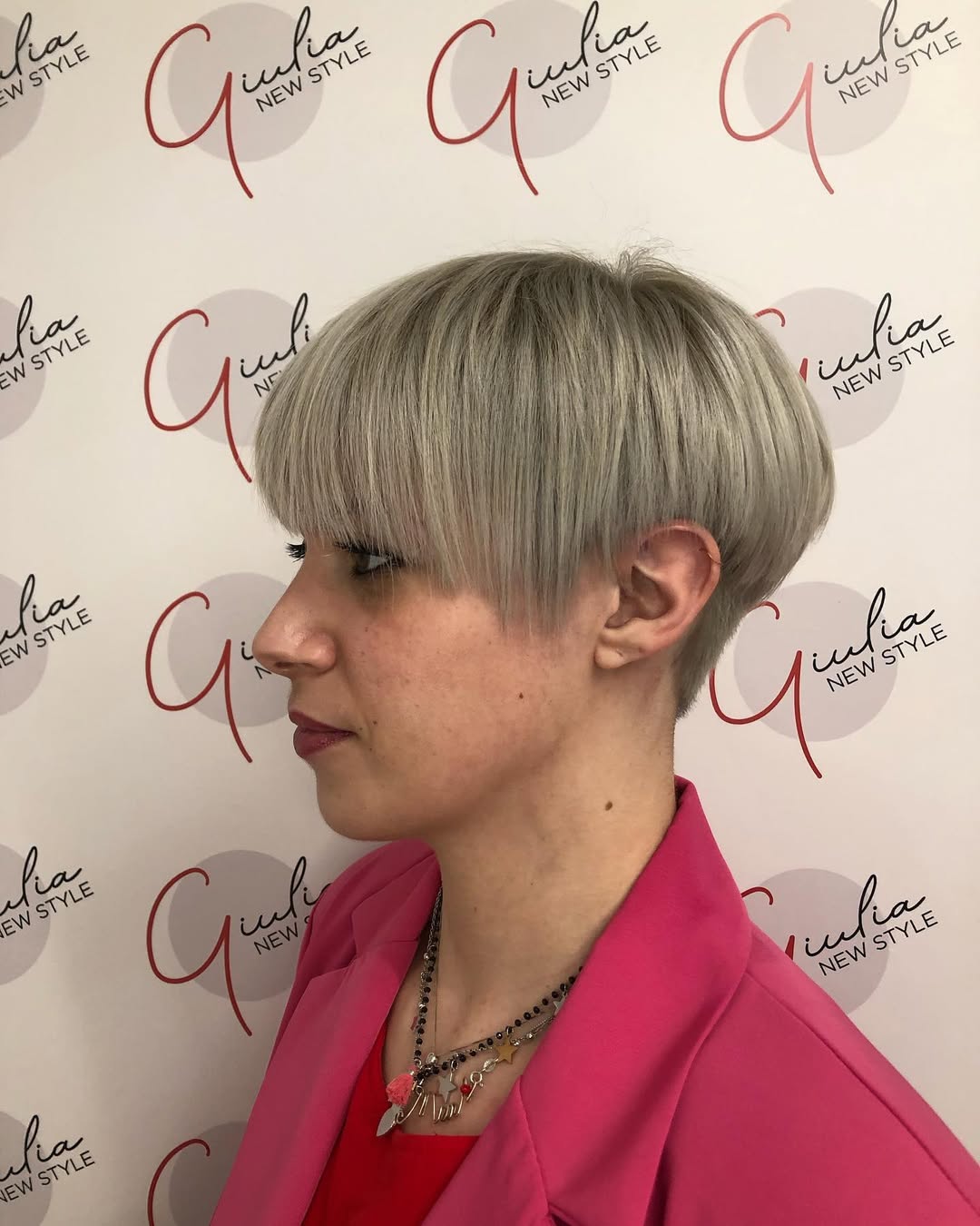 ash blonde pixie bowl cut with bangs