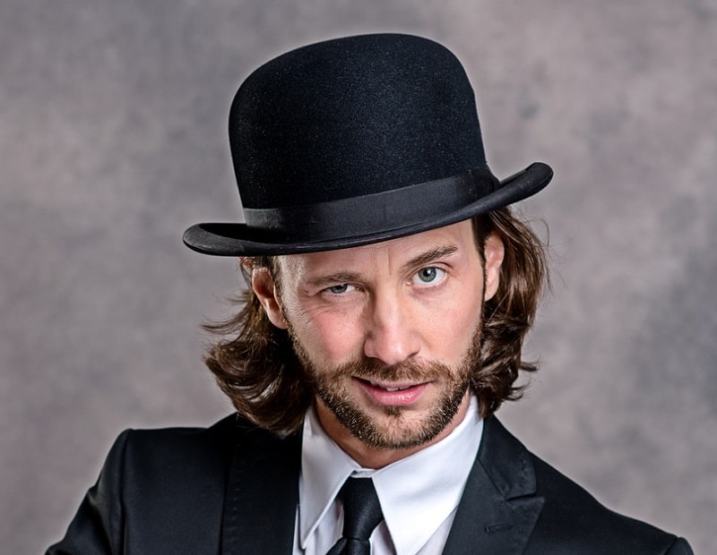 bowler hat for man with long hair