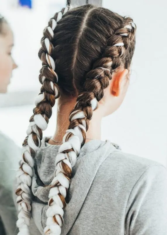 boxer braids hairstyle for yoga