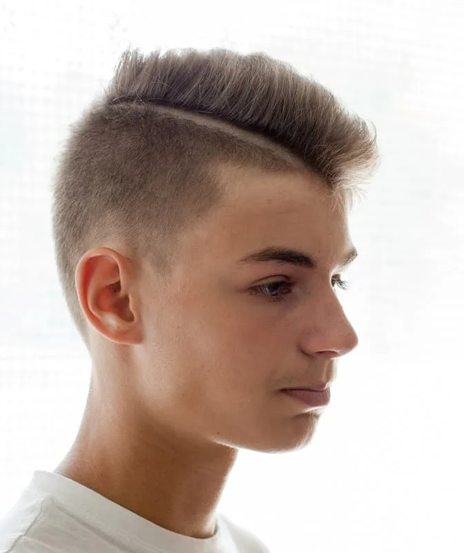 boy with short hard part haircut