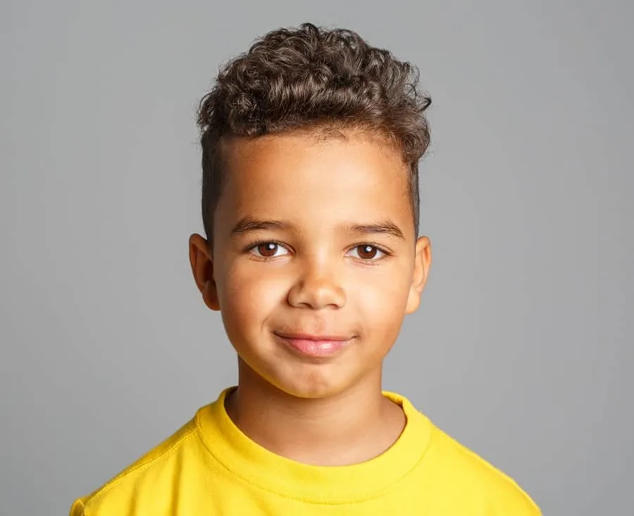 boys long curly top with short sides haircut