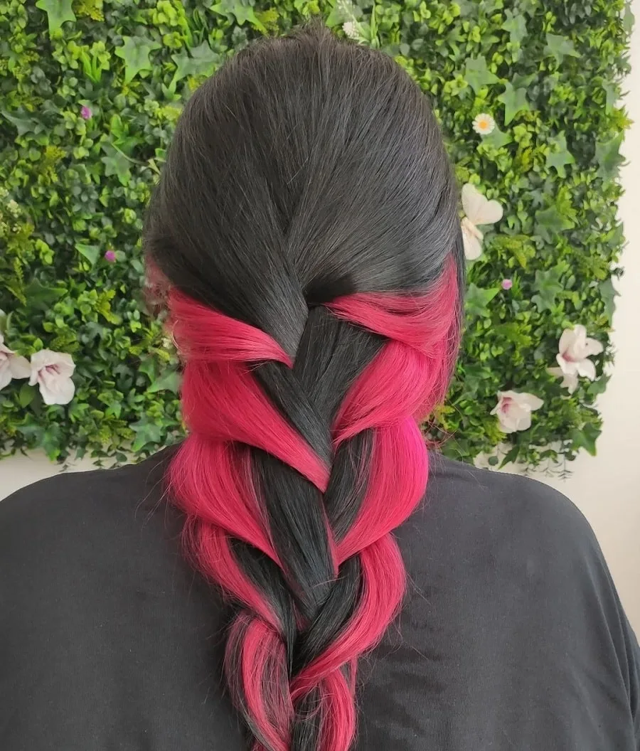 braided black hair with pink underneath