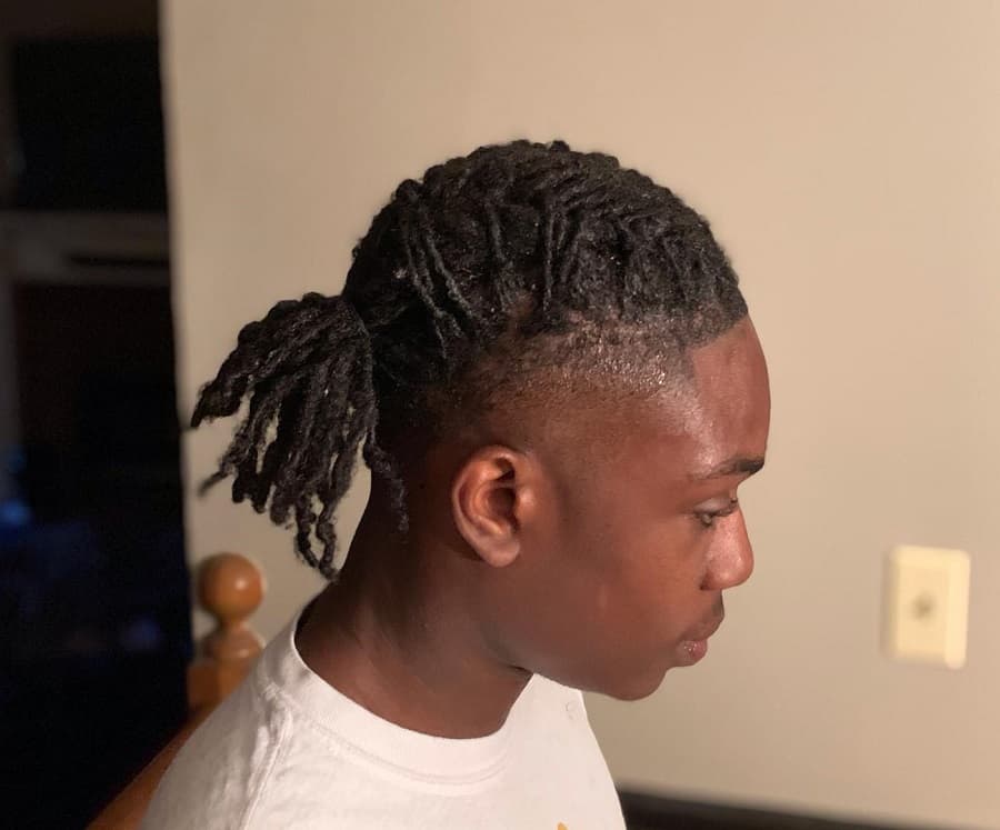 braided dreads with taper fade