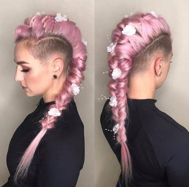braided mohawk with shaved sides and flowers