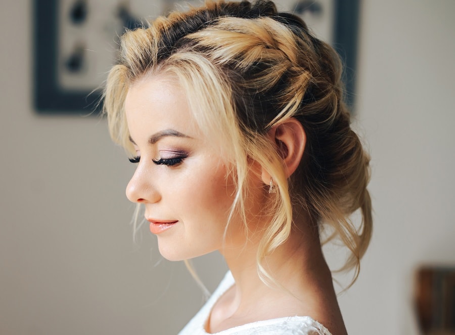 Refined braided hairstyle for a large forehead