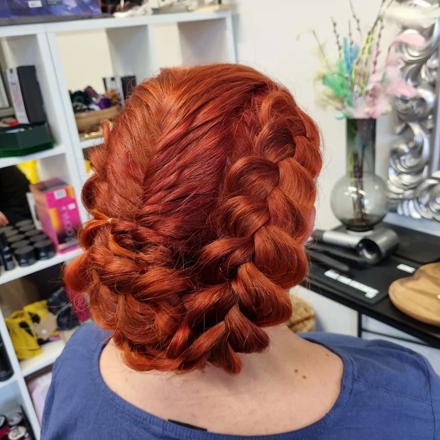 braided updo with copper red hair