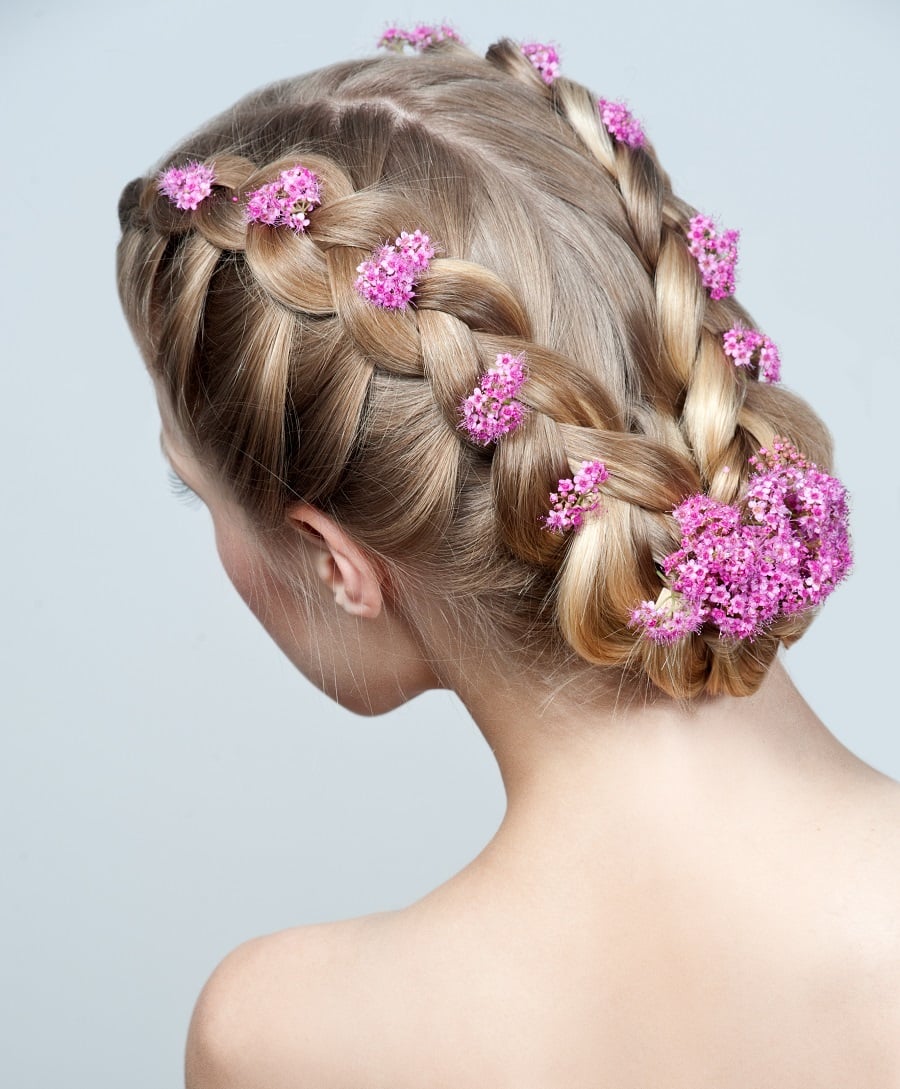 braided updo with flowers for wedding