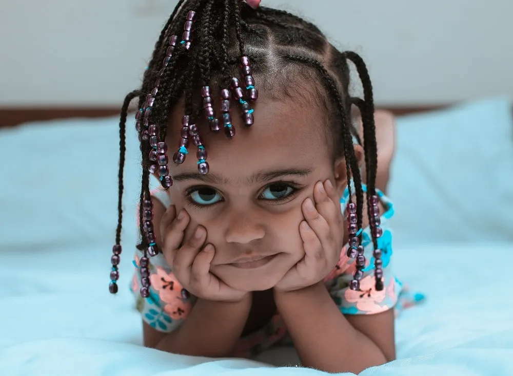 little girls braids with metallic beads
