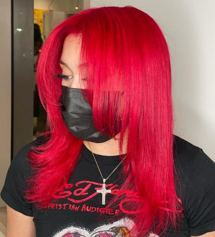 bright red feathered hair