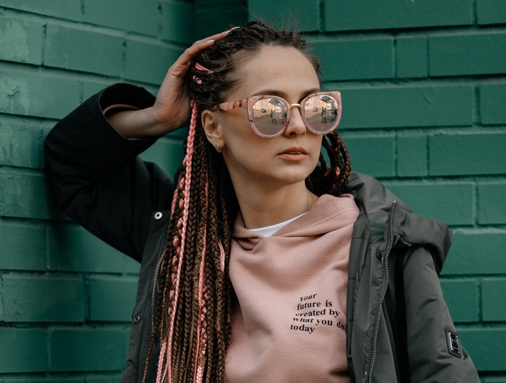 brown and pink box braids with glasses