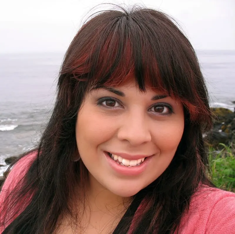 brown bangs with red highlights