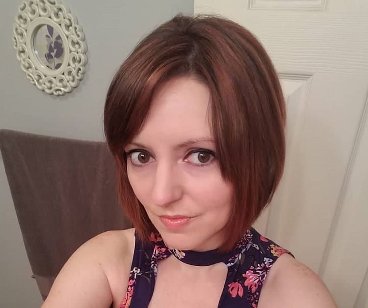 short brown pixie with auburn highlights