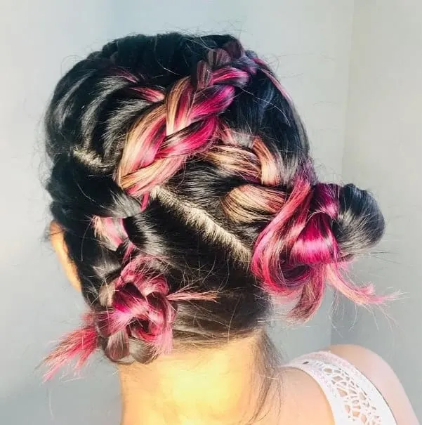 pink highlights in braided brown hair