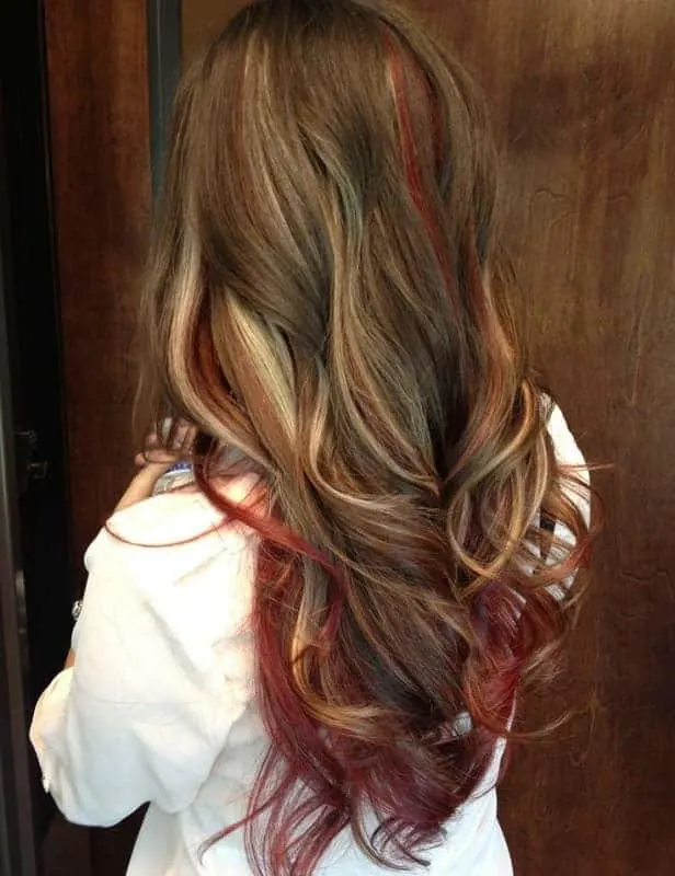 wavy brown hair with red underneath