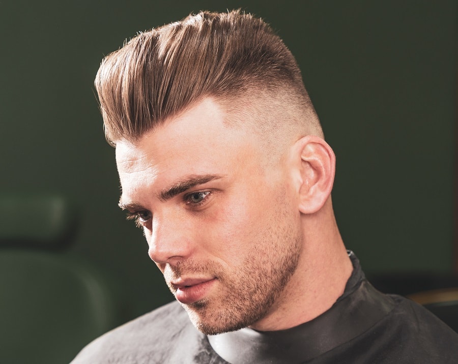 brush up hairstyle with shaved side