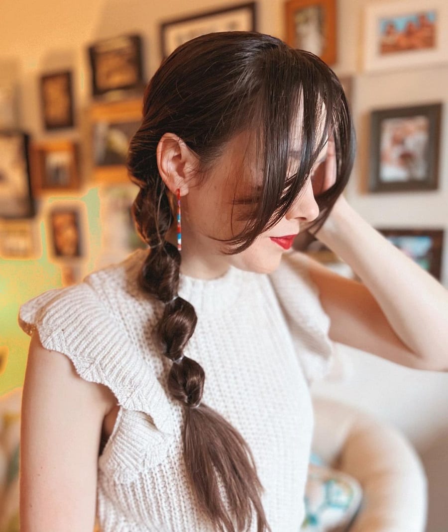 bubble ponytail with bangs