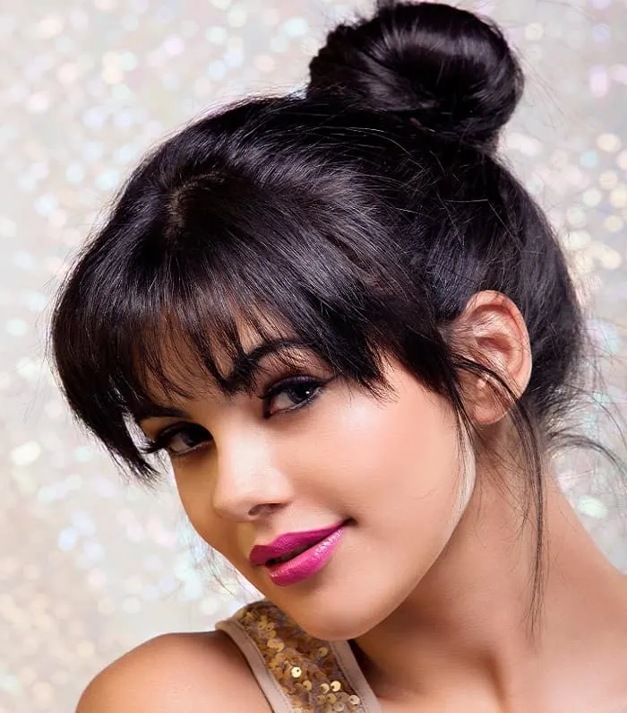 bun hairstyle with bangs