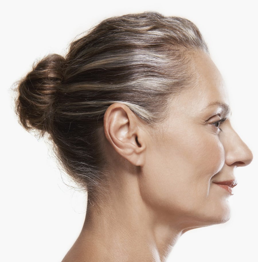 bun updo hairstyle for women over 60