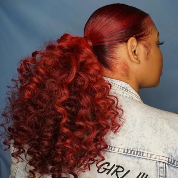 black girl's curly burgundy ponytail