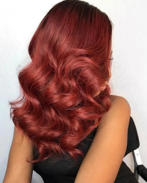 side swept wavy burgundy hair for black girls