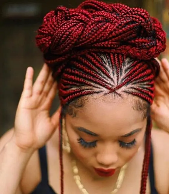 black girl's burgundy braids