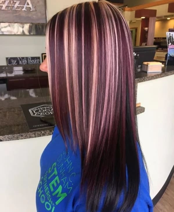 Elegant burgundy hair with honey blonde highlights