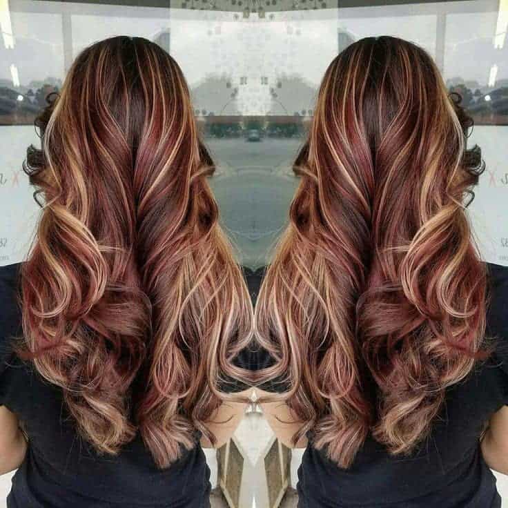 Long burgundy hair with blonde highlights