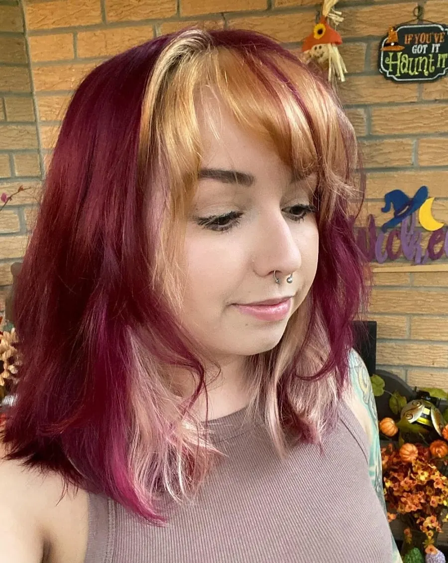 burgundy hair with honey blonde highlights